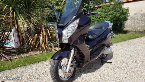 Scooter honda 125, échange contre enduro