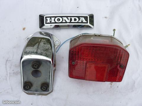 Donne support et feu et plaque HONDA