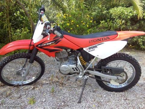 CRF 100 Honda an 2006 à peu servi Excel état
