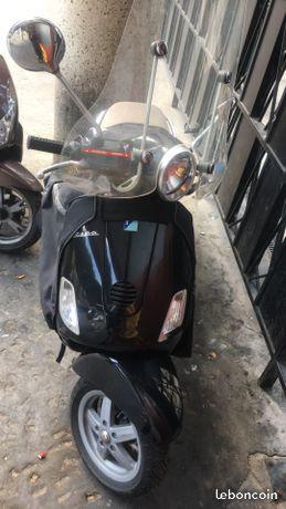 Vespa lx50 noir à saisir